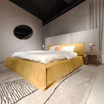 Warm Yellow Suede Upholstered Bed with Minimalist Half-Slat Back Panel & Skirted Base